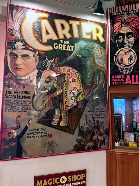 Uncovering the Magic: Authenticating My Early 1900s “Carter the Great” Lithograph 2 A Carter the Great wall poster at a magic shop in Seattle Washington